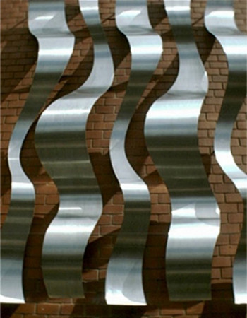 Stainless steel Cladding, Photo courtesy of benson Sedgwick Engineering . Stainless steel Cladding, Photo courtesy of benson Sedgwick Engineering .