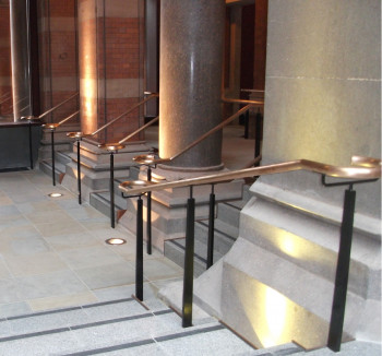 Bronze Handrail, Paddington station, Clarke Construction, Photo courtesy of Clarke construction. Polished architectural balustrades by High Grade Metal Polishers
